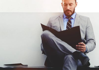 A Barrister reading through documents before going in to the employment tribunal